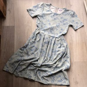 Lularoe Amelia size Small blue with floral pattern